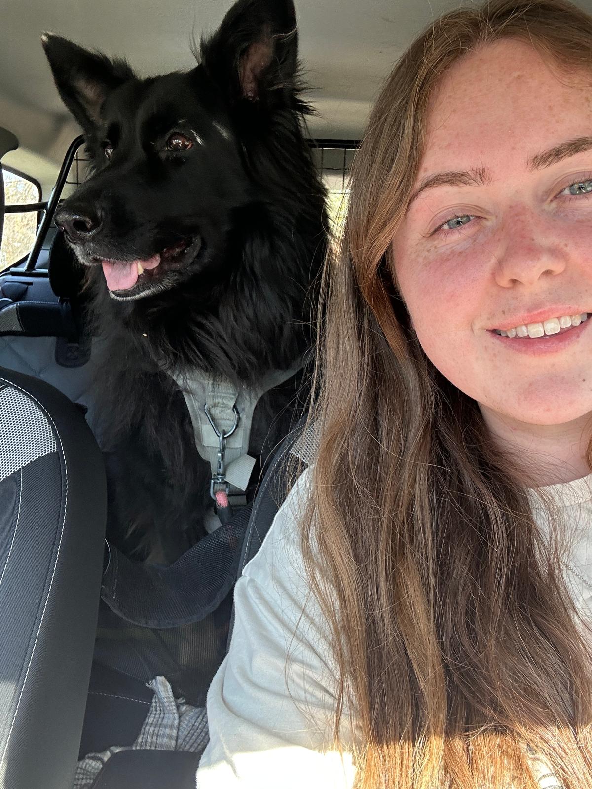 Erin with a dog she cares for in Gravesend
